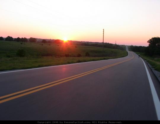 Biking Across Kansas 2006 - Sunrise leaving Burden, Kansas on Hwy 160.