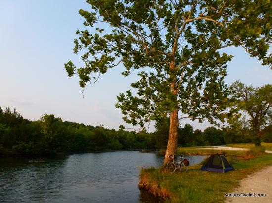 Douglas State Fishing Lake - Bicycle Camping - A bicycle and tent beneath a Cottonwood tree along the shores of Douglas State Fishing Lake.  Primitive camping is free at designated areas along the west side of the lake.