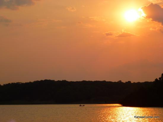 Douglas State Fishing Lake - Sunrise - A fishing boat on the water shortly after sunrise at Douglas State Fishing Lake.