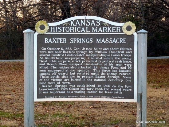 Old Route 66 Park - Historical Marker - This Historical Marker at Old Route 66 Park commemorates the Baxter Springs Massacre:

On October 6, 1863, Gen. James Blunt and about 100 men were met near Baxter's springs by William Quantrill and several hundred Confederates masquerading as Union troops. As Blunt's band was preparing a musical salute the enemy fired. This surprise attack prevented organized resistance, and though Blunt escaped nine-tenths of his men were killed. The raiders also attacked Lt. James Pond and 95 men encamped at the springs. This force was likewise caught off guard but resisted until the enemy retired. These battle sites are in present Baxter Springs. Some of the victims are buried in the national cemetery one mile west of town. Baxter Springs was established in 1866 on the Fort Leavenworth-Fort Gibson military road. For several years it was important as a trading center for Texas cattle.