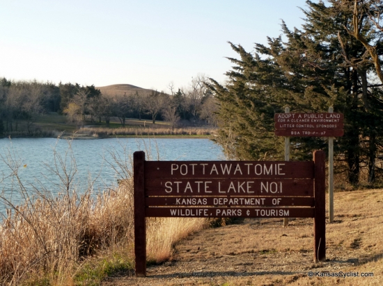 Pottawatomie State Fishing Lake No. 1 - Entrance Sign - This is the entrance sign at Pottawatomie State Fishing Lake No. 1, with the lake visible in the background. There are designated camping areas around most of the perimeter of the lake.