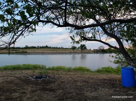 Richmond City Lake - Typical Campsite - This is a typical campsite at Richmond City Lake. It offers a trash can and fire ring, but no other services -- no picnic table, no restroom, no drinking water.