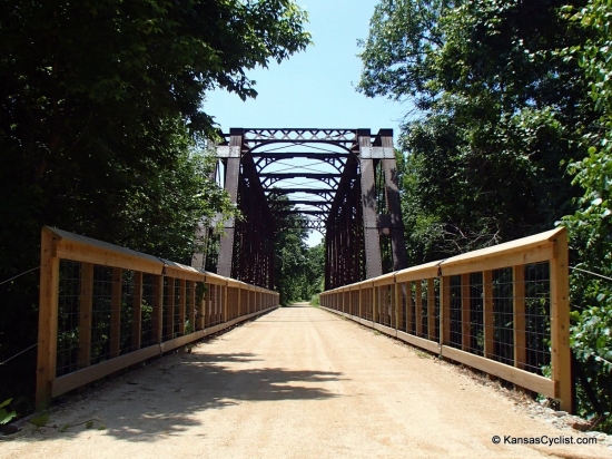 Southwind Rail Trail - Elm Creek Bridge - This is the historic Elm Creek bridge on the Southwind Rail Trail. This bridge originally carried railroad traffic. Railings were added, using wood hand-crafted by a local artisan.