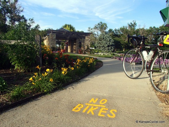 Signs like this send a very unfriendly message to visitors. With all the positive bicycling momentum in Abilene, policies like this are very unfortunate.