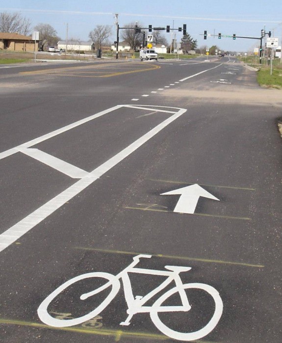 This is the approach to the intersection. Nice job separating the bike lane, but not so good keeping bike lane free from debris.